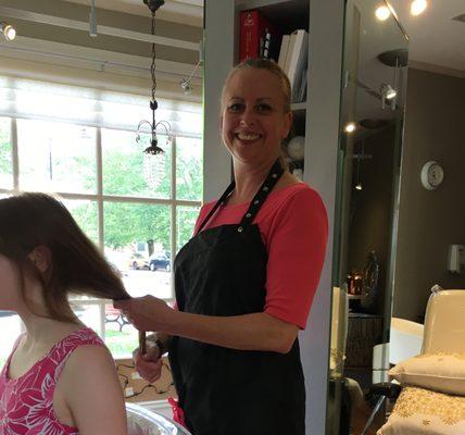 Chris Blais cutting my shy daughter's hair.