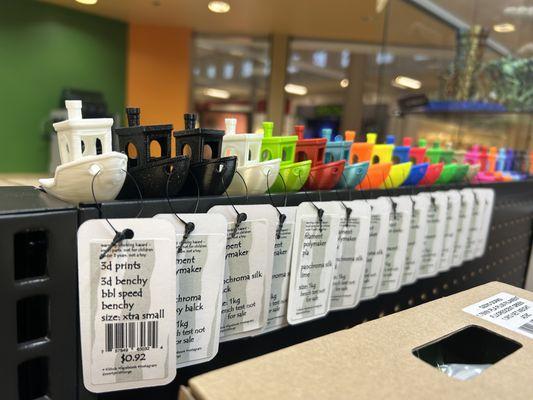 We carry 3D printer filament in a variety of colors and styles--stop in and stock up!