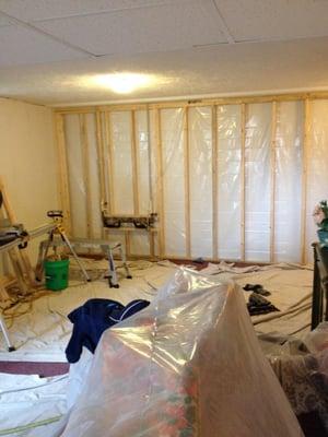 Framing with drylock and 6 mil plastic for moisture protection