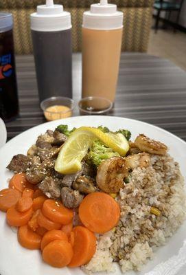 Steak and Shrimp Hibachi, sweet carrots and fried rice.