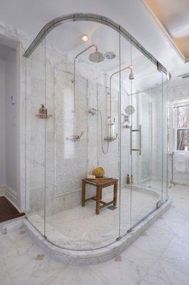 Custom curved glass shower enclosure