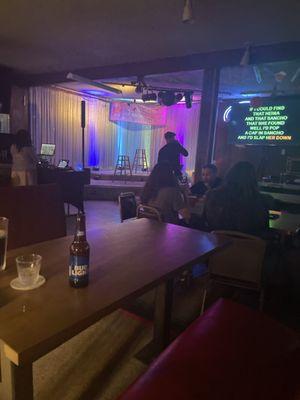 My date doing karaoke