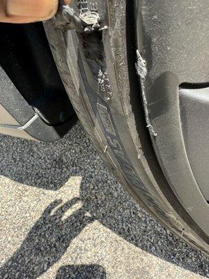 Here's where the valet curbed my tire and gouged my tire and bent my wheel.