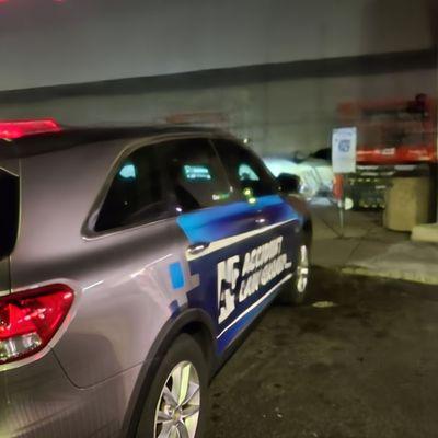 Accident Law Group car parked in an handicapped parking space.