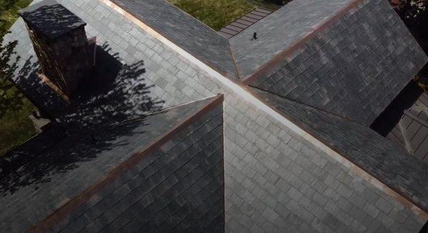 Evergreen Exteriors just completed a stunning slate roof installation, and this one's a real head-turner.