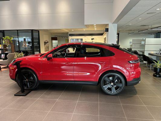 2025 Cayenne Coupe in their showroom. Receptionist & Salespeople watching me take pics and read Maroney label.