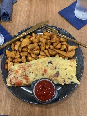Omelette with home fries.