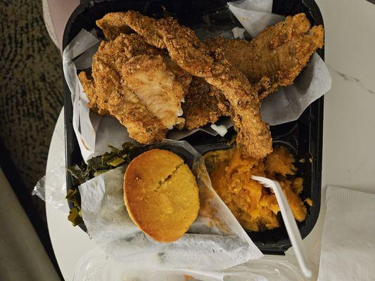 My sister's fried fish dinner with sweet potatoes and cornbread