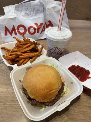 Mooyah burger, sweet potato fries and a Reese's milk shake