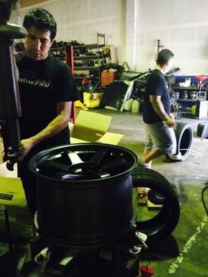 Roberto mounting and balancing my rims and tires.