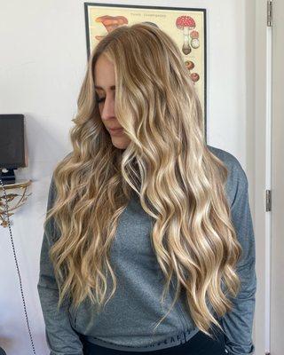 Bright blonde golden highlights on long hair
