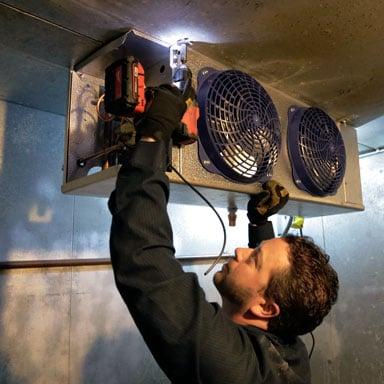 Evaporator coil installation.