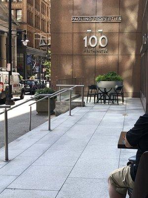 Several outdoor tables for socially distanced sitting