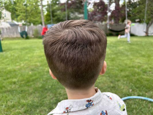 When I told her I wasn't happy with the back she told me it was "bed head" and would go away when he showered. I knew it wasn't.