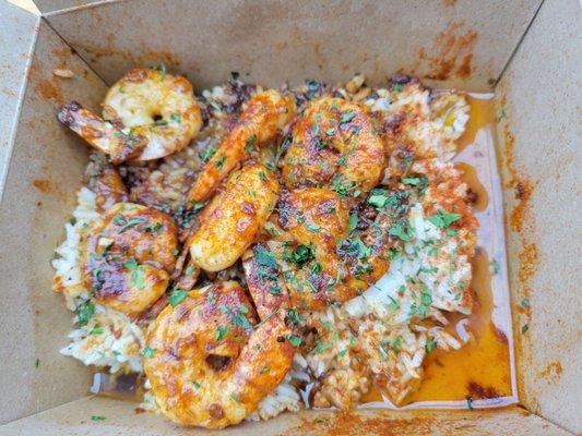 Garlic shrimp over rice