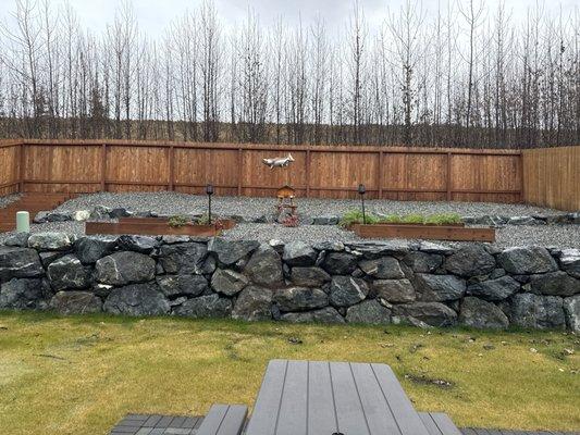 Our rock wall and landscaped yard.