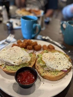 "Yo Adrian" with over easy eggs and everything gluten free bagel.