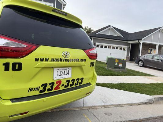 NashVegas Cab parking on sidewalk.