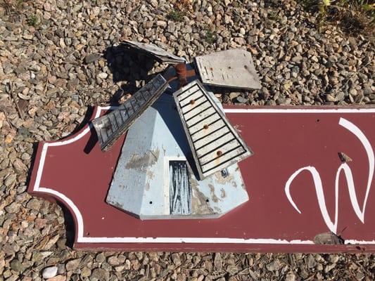Close Up Detail of the old Windmill Liquors sign.