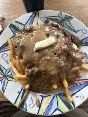 Leroy Poutine. Curds, brown gravy, hamburger, and bacon added