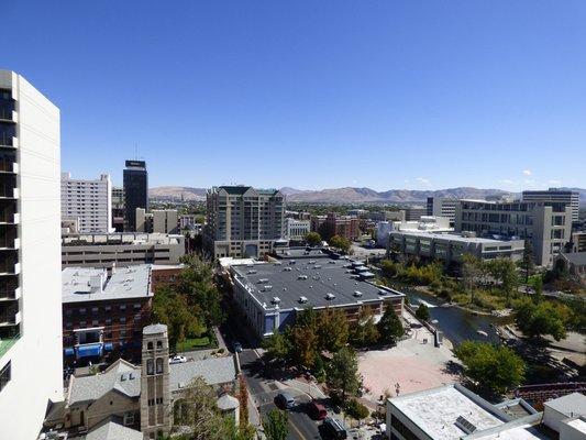 View of Truckee river, mountains, city.