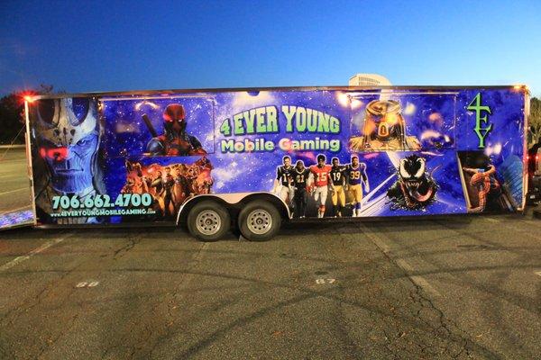 Tailgate party outside view of game truck