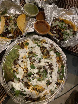 Carne asada fries, pastor tacos, carne asada tacos