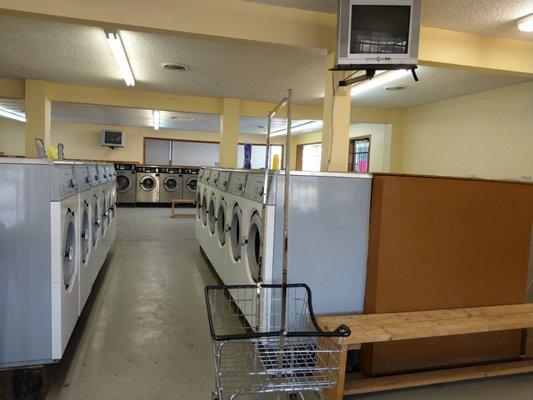Lots of machines. $2 per load, 25¢ each for prewash and extra rinse.