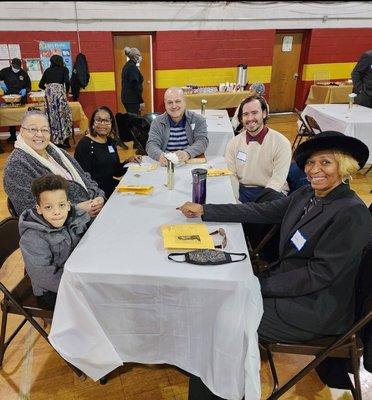Some New City family & friends that attended the MLK Brunch sitting with Pastor Johnny Quiros.
