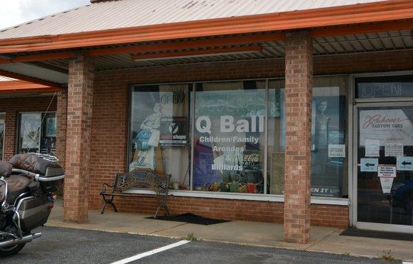 Q-Ball Family Arcades and Billiards