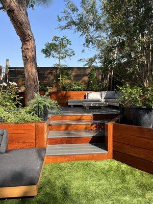Custom deck and planters covered with Brazilian walnut.