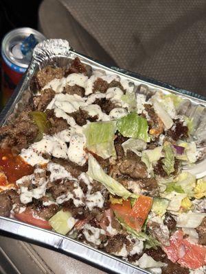 Partially eaten gyro salad. Loved it!