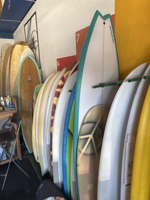 amazing selection of new and used surfboards!