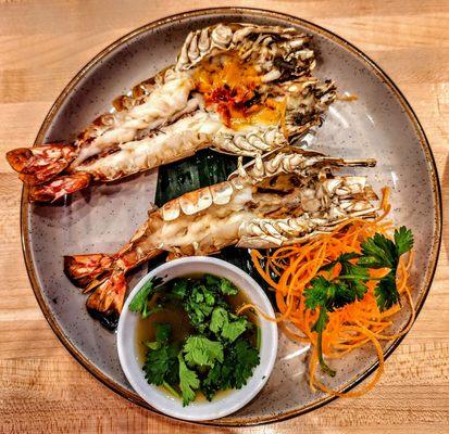 Grilled Shrimp - Goong Yang: Grilled Thai river prawn served
with spicy chili lime dressing. $15