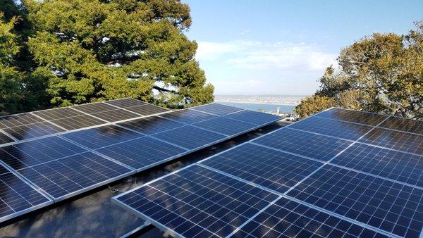 Roof mounted Solar array tilted up on a flat roof in Monterey