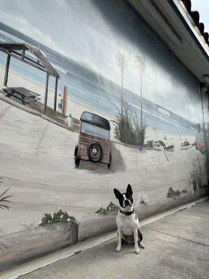 Mural in the back with more benches.