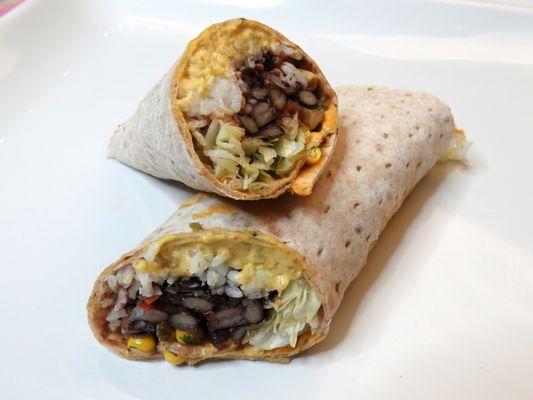 Cornquistador
White rice, seasoned black bean, corn salsa fresca, shredded iceberg lettuce. Signature chipotle corn + pumpkin seed sauce