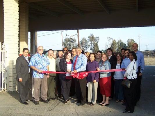 The Dentist is the one cutting the ribbon :)