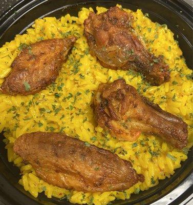 Delicious Yellow Rice and 5 Chicken Wings ( Lemon Pepper, Garlic and Herbs, Louisiana Cajun Chicken) Call for options of flavor