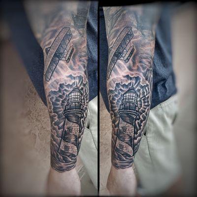 Lighthouse and plane tattoo done by DJ