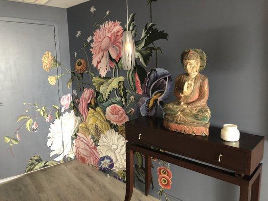 Entryway with floral wallpaper