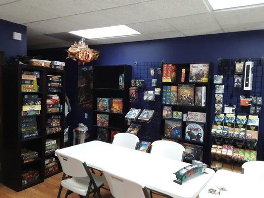 Boardgames on the left are store owned and available for anyone to play.
