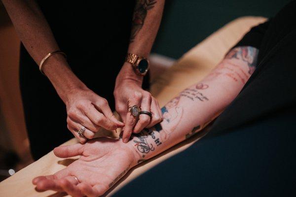 Acupuncture uses tiny sterile needles to help with health concerns including pain management and stress relief.