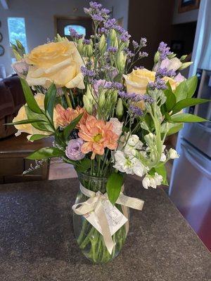 My "Foothills" sized bouquet with purple theme. Mother was astounded at the size of the roses and the gentle summery color palette.