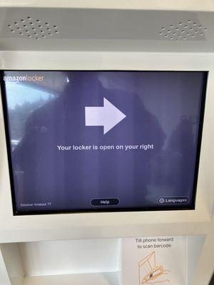 After scanning your barcode, the screen directs you to the locker door that should open up automatically. There may be a small wait.