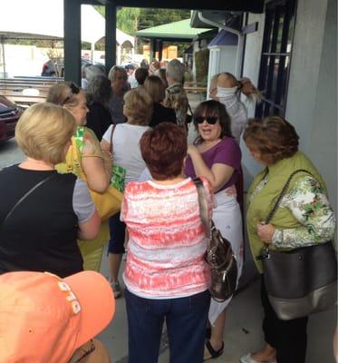 Waiting for the shop to open. Early Sunday morning. Make and takes in the parking lot.