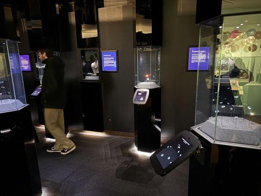 Precious gems and jewelry on display.