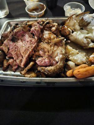 Prime Rib, mushrooms, au ju, baked potato, carrots. Delish Homemade Bread!
