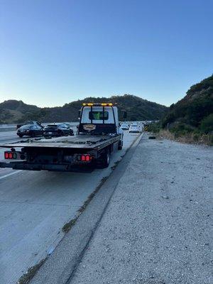 this is the tow truck thief that's out there looking for people in need of help to rob!