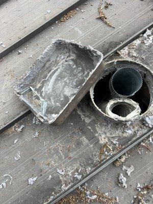 Dryer vent cleaning on the roof
